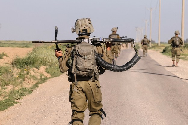 Izraelscy żołnierze w pobliżu granicy ze Strefą Gazy /MENAHEM KAHANA / AFP /East News