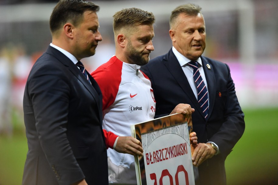 Jakub Błaszczykowski (C) i prezes PZPN Cezary Kulesza (P) /Piotr Nowak /PAP