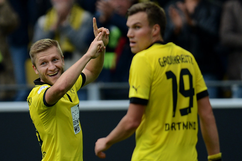 Jakub Błaszczykowski cieszy się z gola dla Borussii podczas meczu z Bayerem /AFP