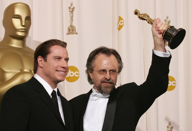 Jan A.P. Kaczmarek odebrał Oscara z rąd Johna Travolty /Carlo Allegri /Getty Images