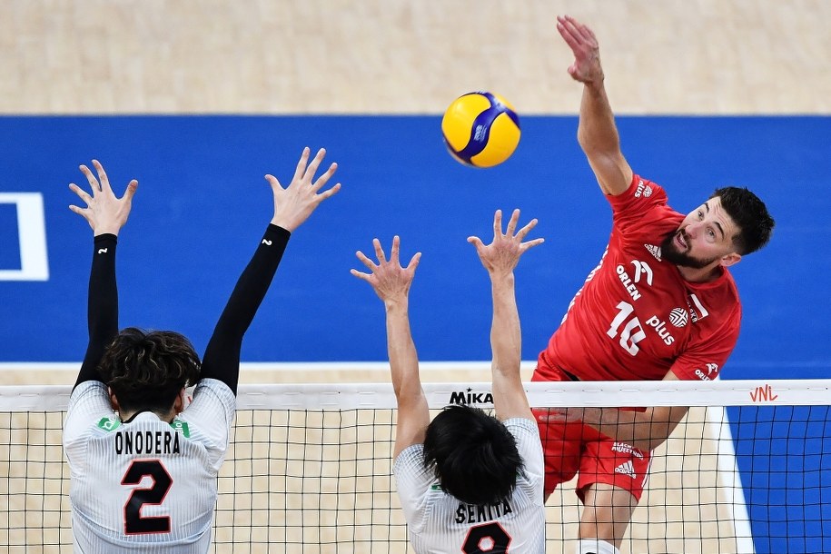 Japończyk Japończycy Taishi Onodera (L) i Masahiro Sekita (C) oraz Polak Barosz Bednorz (P) / 	Adam Warżawa    /PAP