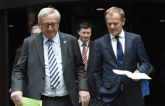 Jean-Claude Juncker i Donald Tusk po spotkaniu na szczycie /AFP