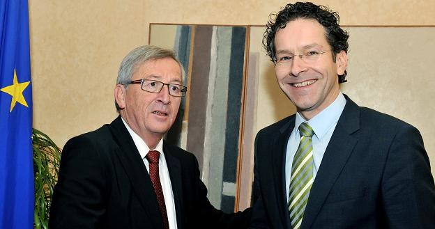 Jean-Claude Juncker (L) i Jeroen Dijsselbloem /AFP