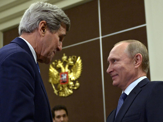 John Kerry i Władimir Putin podczas spotkania w Soczi fot. Aleksei Nikolsky / RIA Novosti /AFP