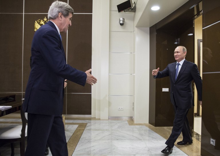 John Kerry i Władimir Putin /AFP
