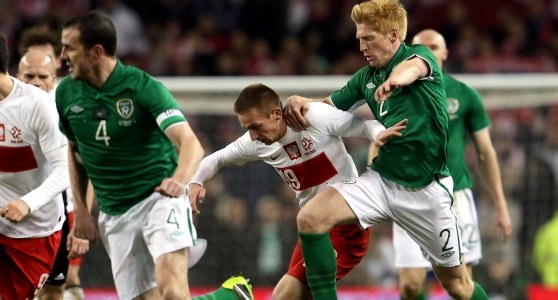 John O'Shea, Polak Szymon Pawłowski i Paul McShane /Radek Pietruszka /PAP