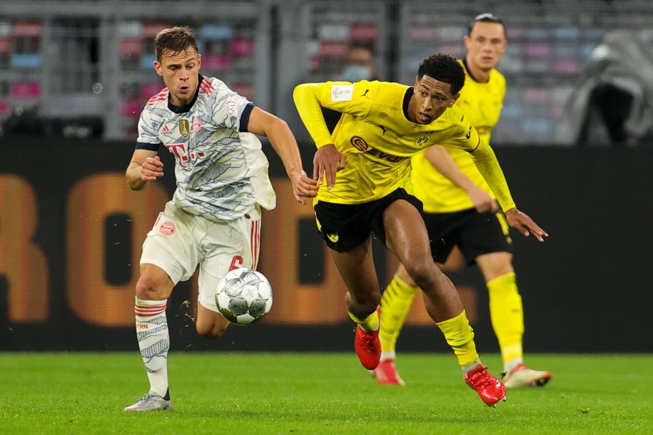 Joshua Kimmich i Jude Bellingham w trakcie meczu o Superpuchar Niemiec /Friedemann Vogel /PAP/EPA