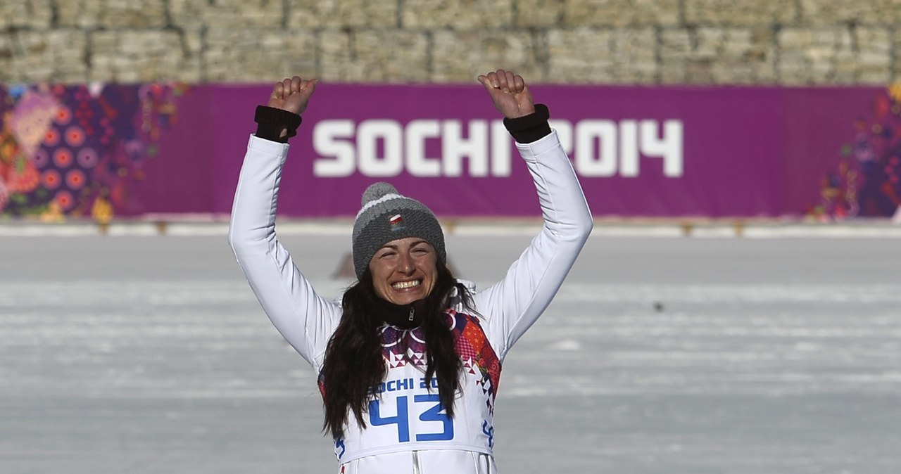 Justyna Kowalczyk na podium /AFP