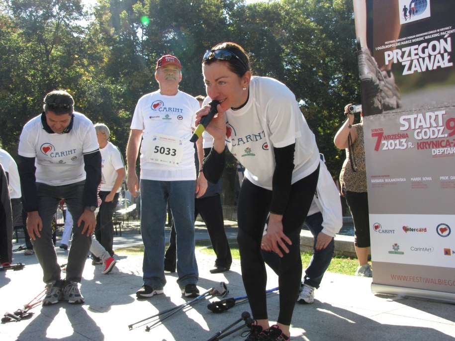 Justyna Kowalczyk podczas rozgrzewki przed marszem /Maciej Pałahicki /RMF FM