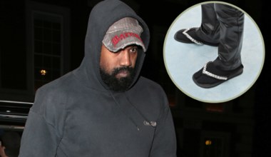 Kanye West w klapkach i skarpetkach zadaje szyku na pokazie mody