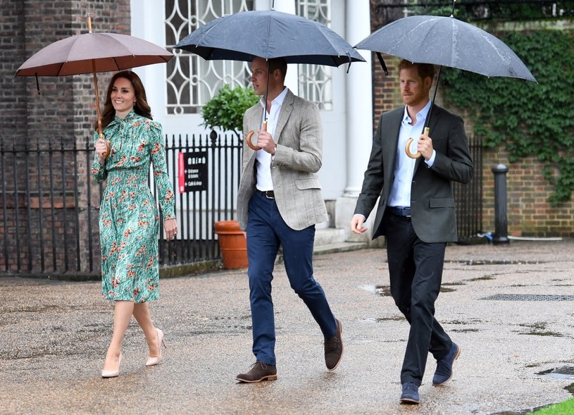Kate, William, Harry /Anwar Hussein /Getty Images