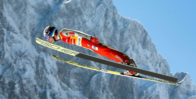Kenneth Gangnes podczas drużynowego konkursu lotów narciarskich w słoweńskiej Planicy, marzec 2016 /ANTONIO BAT /PAP/EPA