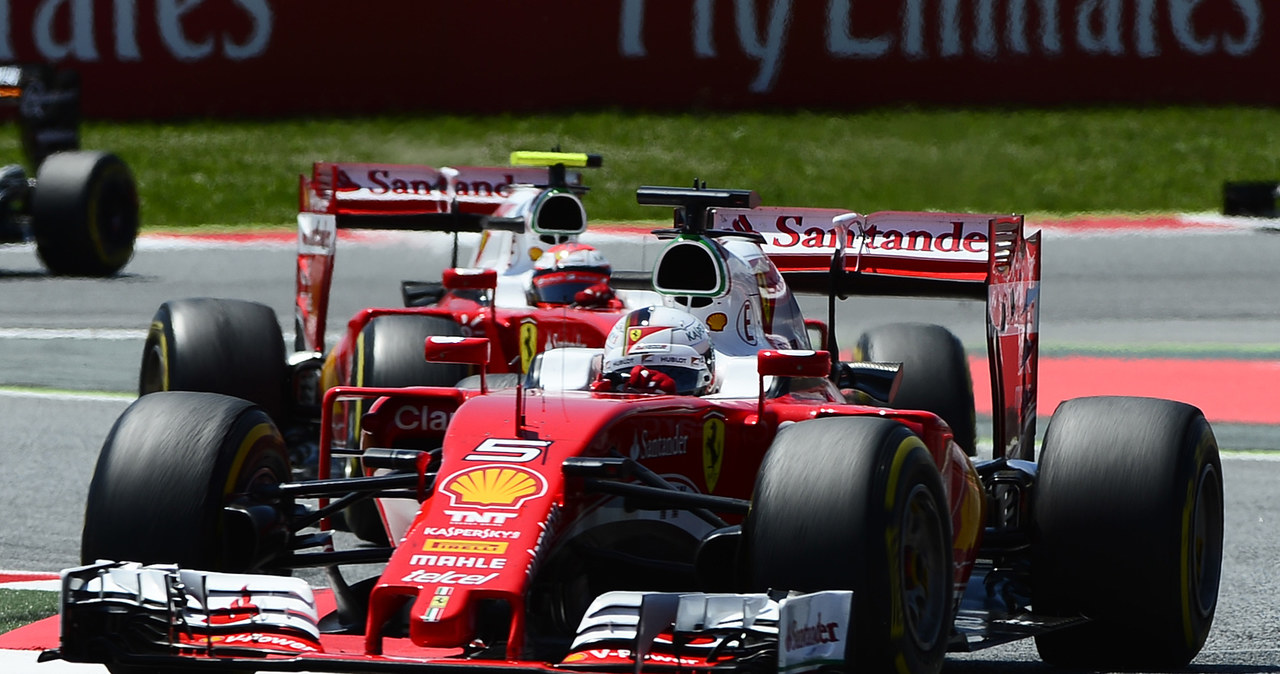 Kierowcy Ferrari:  Kimi Raikkonen i  Sebastian Vettel /AFP