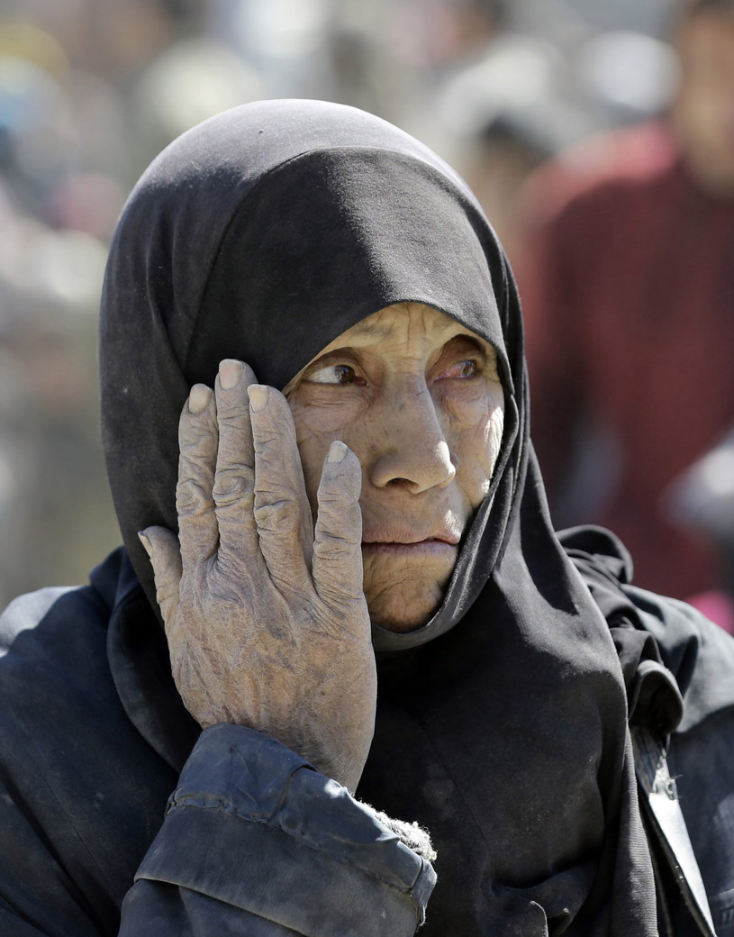 Kobieta ewakuowana ze Wschodniej Ghuty /LOUAI BESHARA /AFP