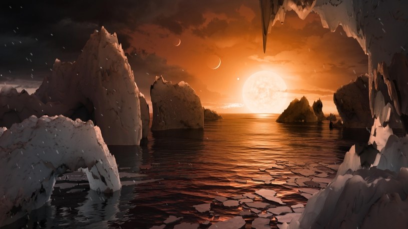 Koncepcja tego artysty pozwala nam wyobrazić sobie, jak by to było stać na powierzchni egzoplanety TRAPPIST-1f, znajdującej się w układzie TRAPPIST-1 w konstelacji Wodnika /NASA/JPL-Caltech /domena publiczna