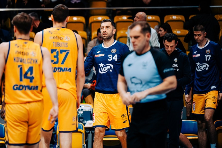 Koszykarz Adam Hrycaniuk /Mateusz Słodkowski /