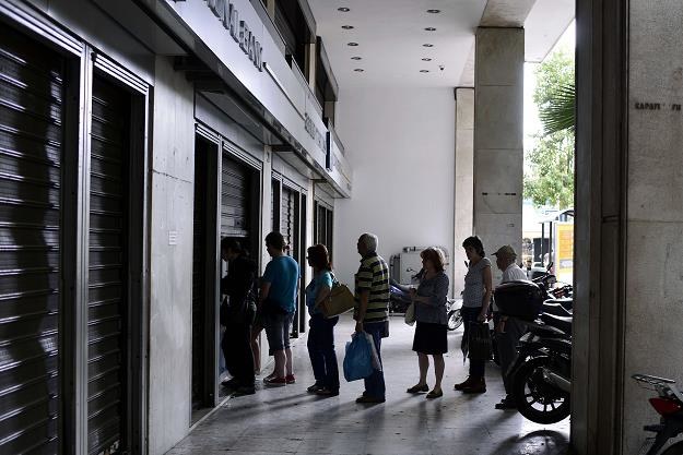 Kryzys w Grecji: Referendum niepewne; przed bankomatami długie kolejki /AFP