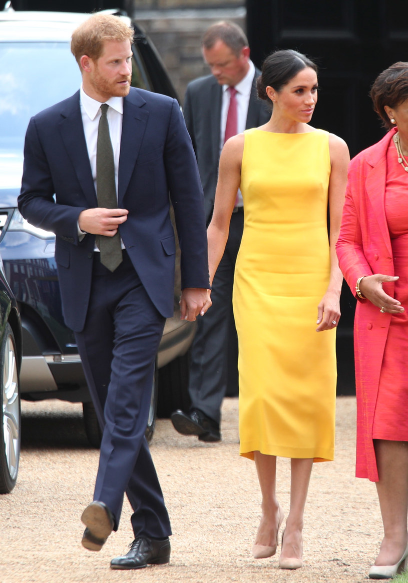 Książę Harry i Meghan Markle trzymają się za ręce /WPA Pool /Getty Images