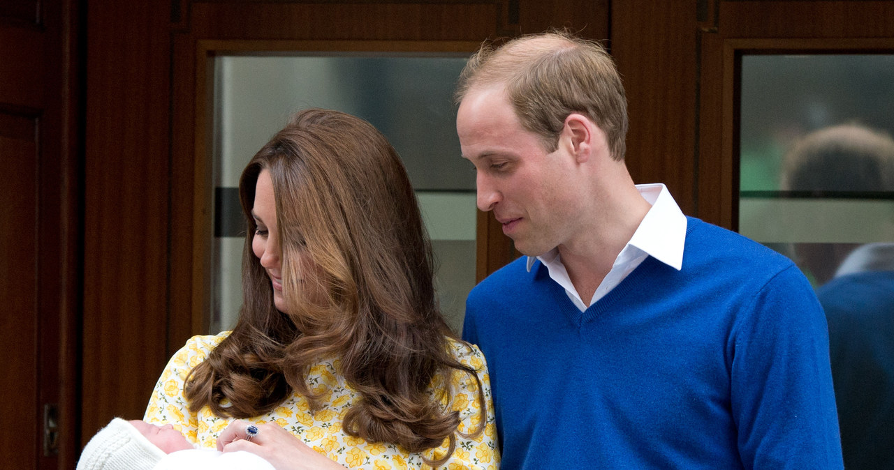 Księżna Kate i książę William z Charlotte w 2015 roku /Zak Hussein /Getty Images