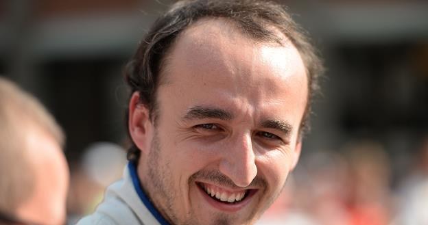 Kubica ma powody do zadowolenia /AFP