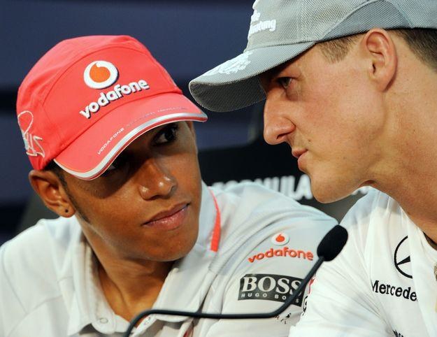 Lewis Hamilton i Michael Schumacher /AFP