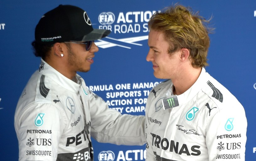 Lewis Hamilton (z lewej) i Nico Rosberg /AFP