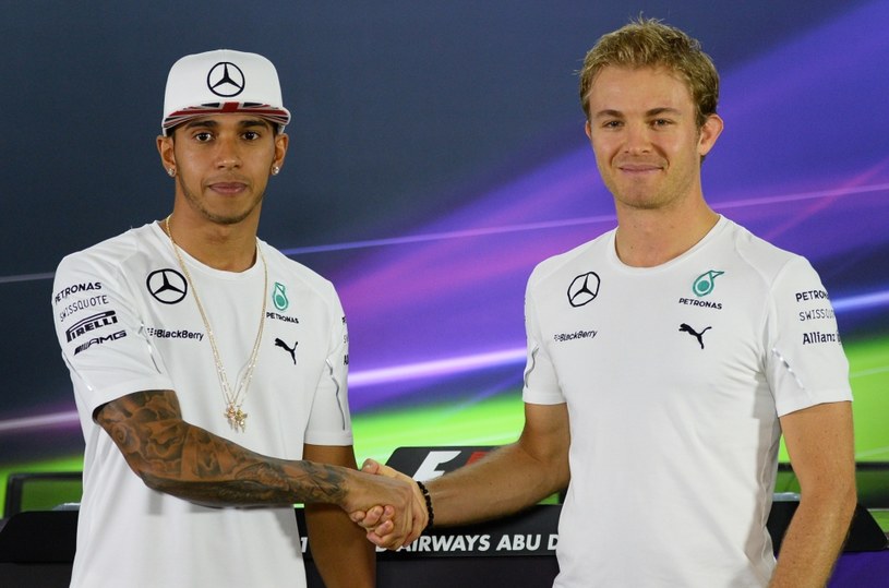 Lewis Hamilton (z lewej)  i   Nico Rosberg /AFP