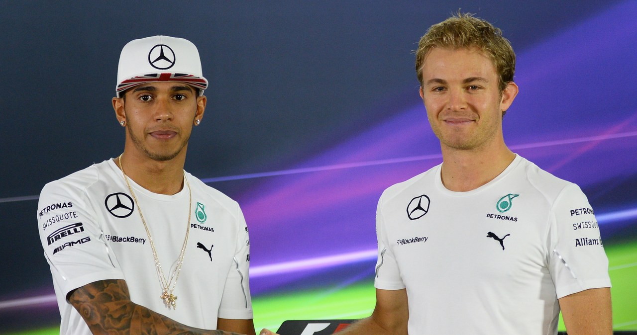 Lewis Hamilton (z lewej)  i   Nico Rosberg /AFP