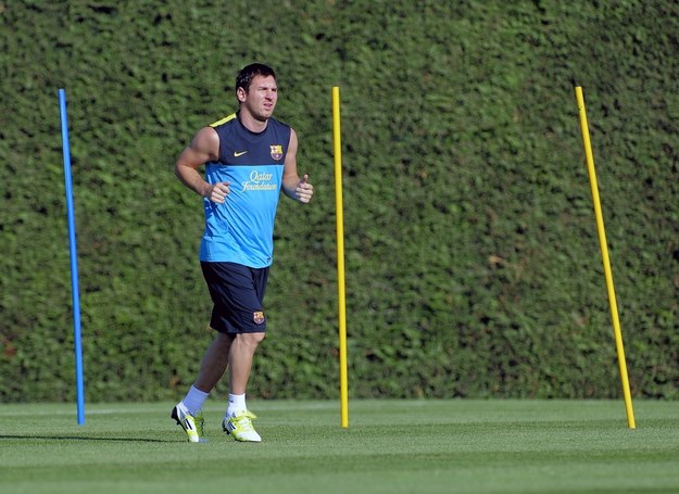 Lionel Messi na pierwszym treningu Barcy przed sezonem 2012/2013. /AFP