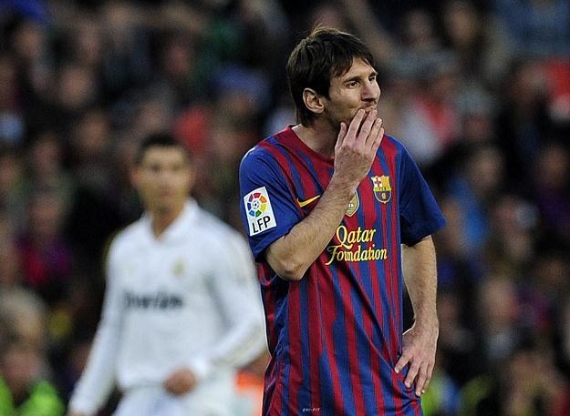 Lionel Messi niepocieszony po porażce w Gran Derbi /AFP