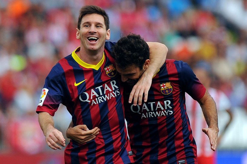 Lionel Messi oraz Cesc Fabregas /AFP