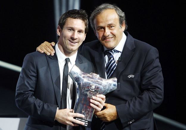 Lionel Messi (z lewej) i Michel Platini. /AFP