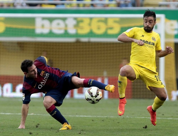 Lionel Messi został kontuzjowany podczas meczu z Villarreal /DOMENECH CASTELLO /PAP/EPA