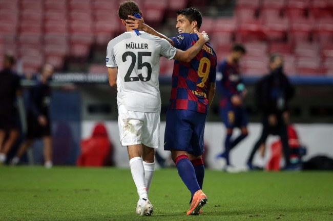 Luis Suarez i Thomas Mueller /TIAGO PETINGA /PAP/EPA