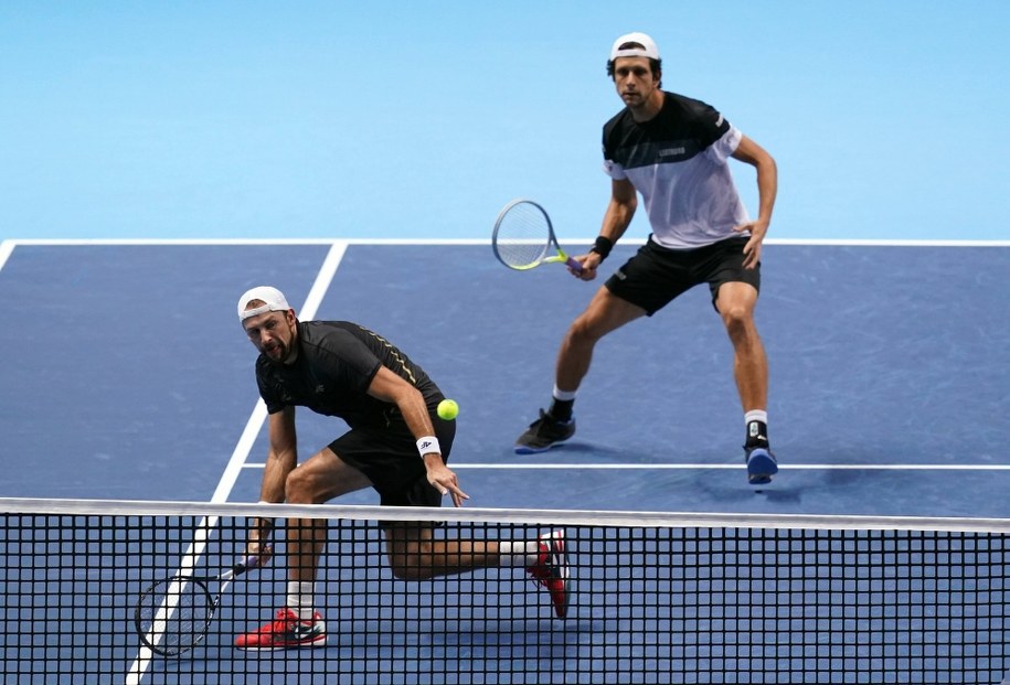 Łukasz Kubot (L) i Marcelo Melo (P) /John Walton    /PAP/EPA