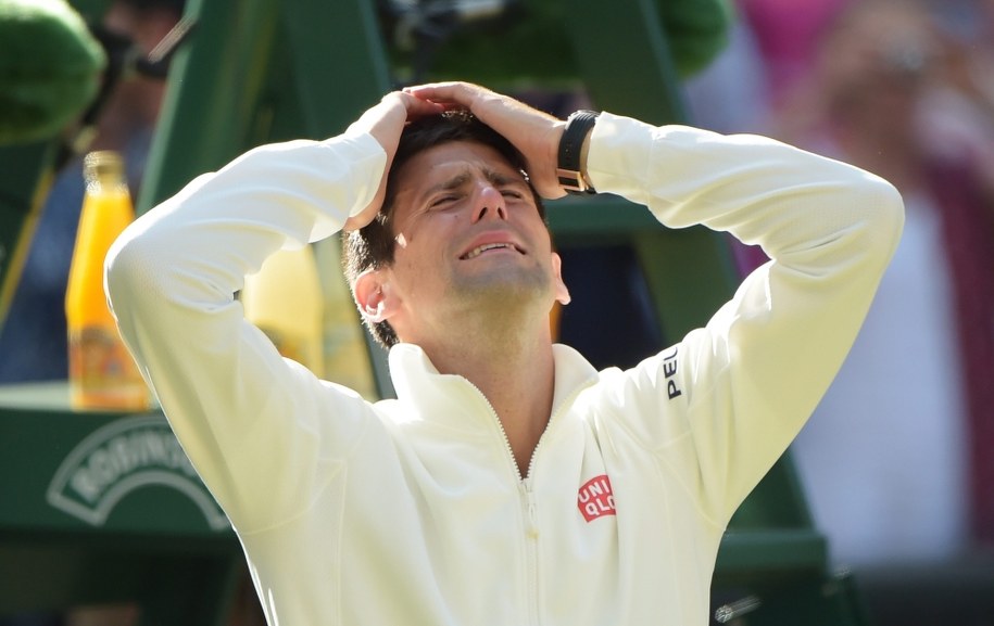 Łzy radości Serba po wygranym finale /FACUNDO ARRIZABALAGA /PAP/EPA