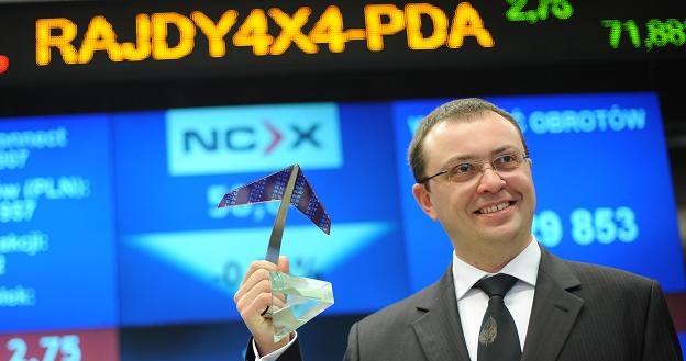 Maciej Chełmiński, prezes firmy Rajdy 4x4, podczas debiutu na NewConnect /PAP