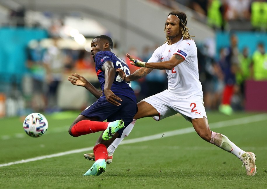 Marcus Thuram i Kevin Mbabu /Marko Djurica / POOL /PAP/EPA