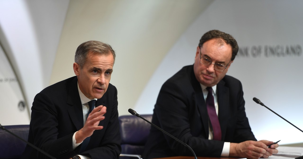 Mark Carney (L) , odchodzący gubernator Banku Anglii i Andrew Bailey (P), nowy od poniedziałku gubernator BA /AFP
