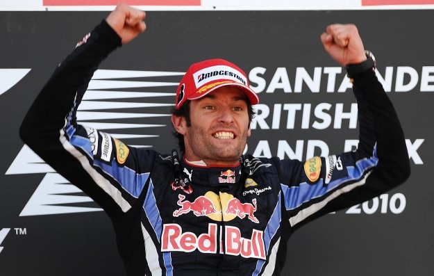 Mark Webber cieszy się na podium GP Wielkiej Brytanii /AFP