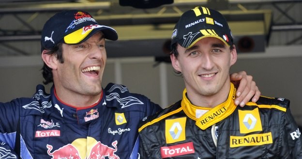 Mark Webber i Robert Kubica - bohaterowie sobotnich kwalifikacji /AFP