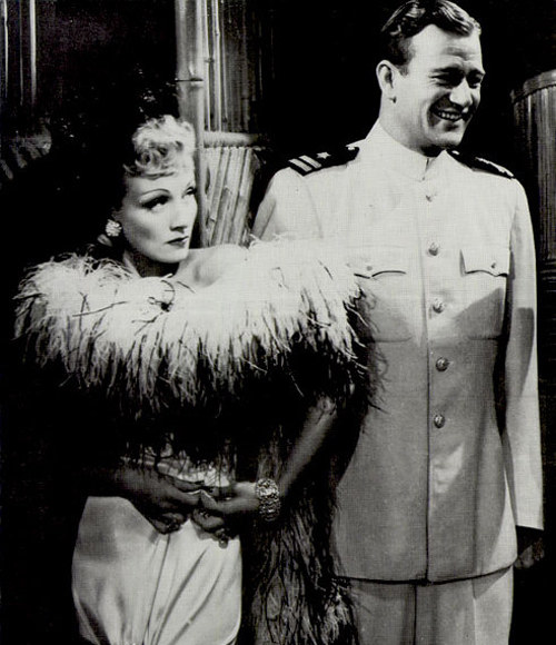 Marlene Dietrich i John Wayne na plakacie filmu "Siedmiu grzeszników" (Seven Sinners, 1940) /materiały prasowe