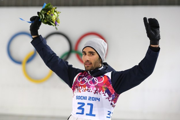 Martin Fourcade w czasie ceremonii kwiatowej /ARMANDO BABANI  /PAP/EPA