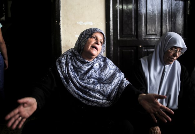 Matka płacząca nad losem swojego dziecka /HAITHAM IMAD /PAP/EPA