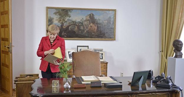 Merkel ujęła się za niemieckimi producentami samochodów /AFP