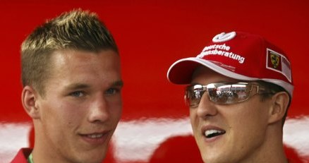 Michael Schumacher i Lukas Podolski /AFP