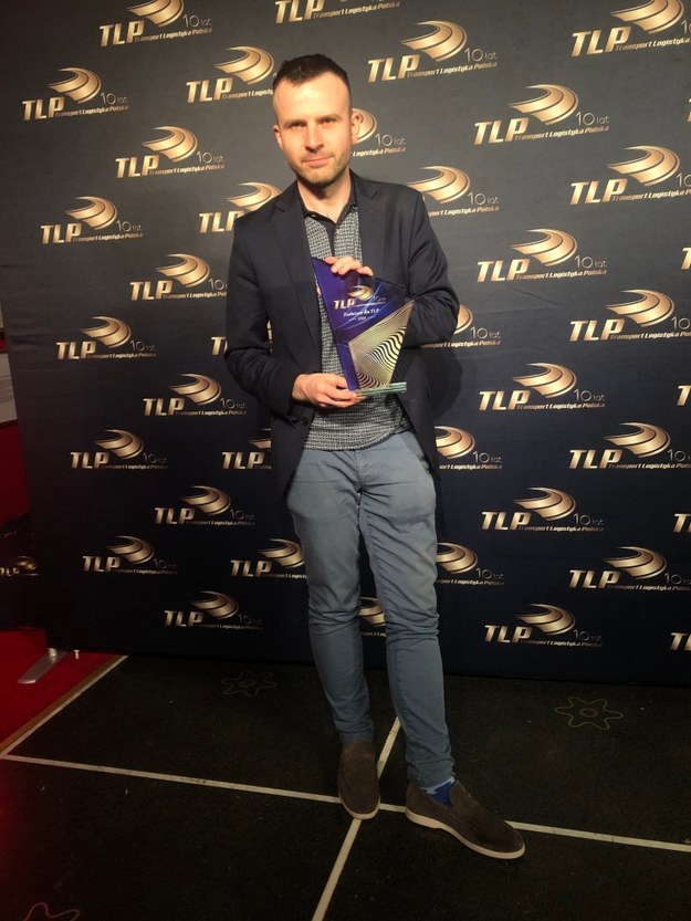 Michał Dobrołowicz odbiera nagrodę w imienu RMF FM /RMF FM