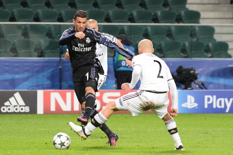 Michał Pazdan (z prawej) i Cristiano Ronaldo /AFP