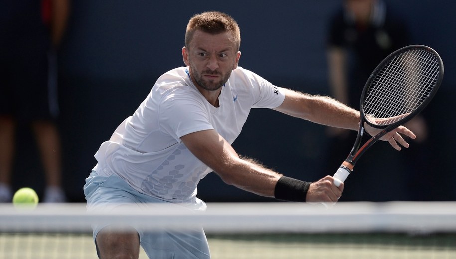 Michał Przysiężny odpadł w pierwszej rundzie US Open /ANDREW GOMBERT /PAP/EPA