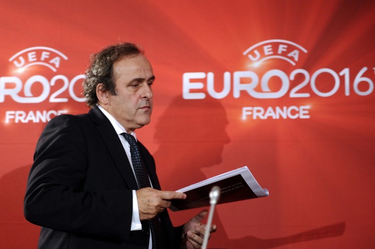 Michel Platini, prezydent UEFA - czy na Euro 2016 będzie "telewizyjny podatek"? /AFP